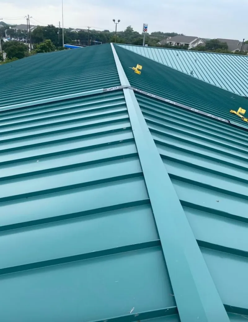 Green commercial metal roof ridge and valley for Metal Roof Repair in Keene